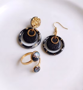 Órbita – Elegancia en Negro y Dorado